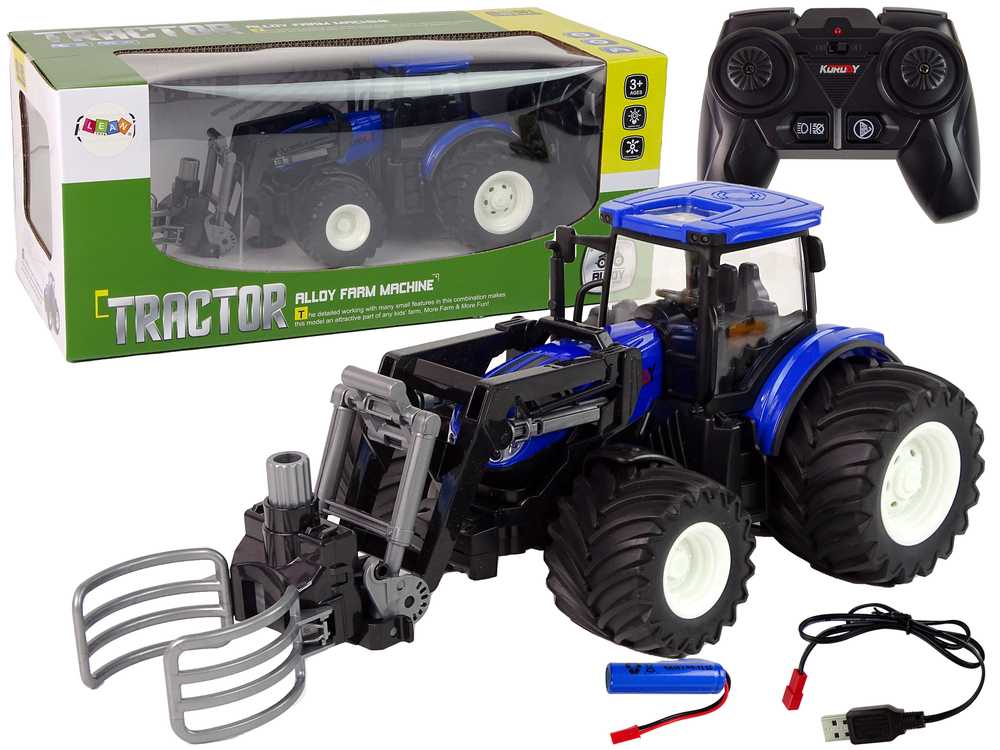 Nuotoliniu būdu valdomas traktorius su grėbtuvu, mėlynas
