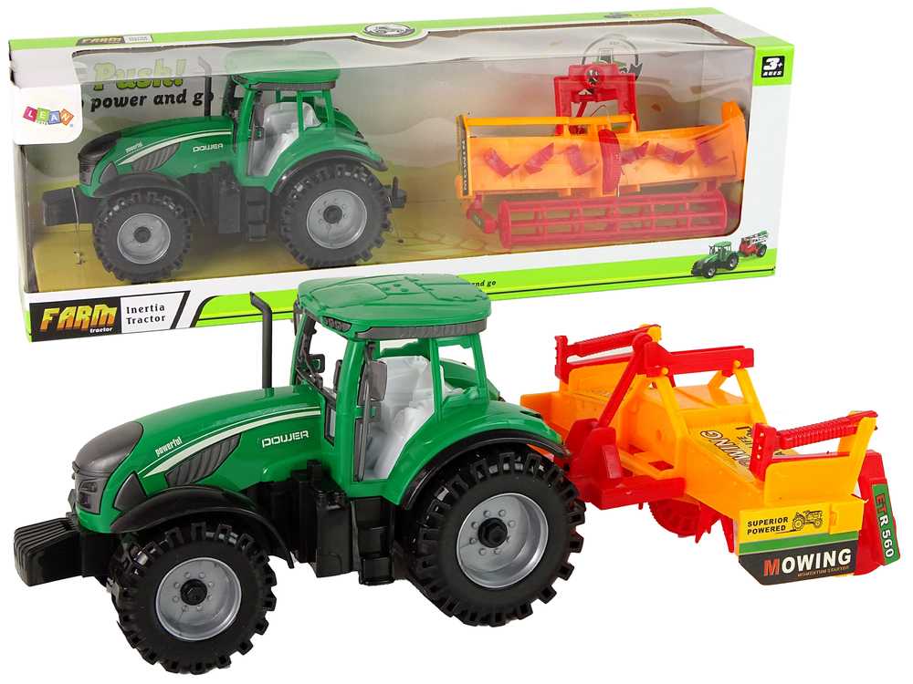Žalias traktorius su oranžiniu kultivatoriumi 